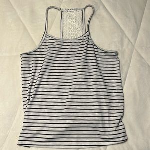 Women’s white and black striped tank top. Lace on the back. Women’s 16.